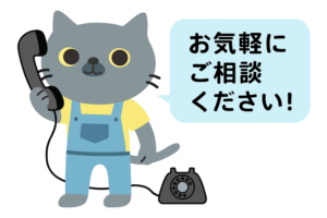 電話でお問い合わせに対応する塗装職人の猫キャラクターイラスト